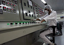 Iran's Uranium Stockpile: Worker at Uranium Conversion Facility in Iran