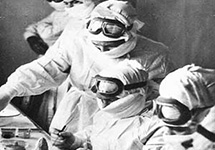 Soviet anti-plague scientists wearing special suits for protection against the plague bacilli (archival photo).
