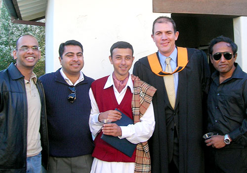 Kartik center with his compatriots and professor duPreez