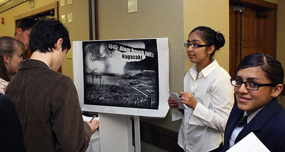 Charles Weber Institute student explains nuclear nonproliferation art work