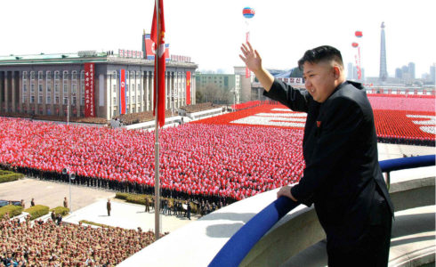 Kim Jong Un presides over military parade. Image credit Omgyjya North Korea/Flickr