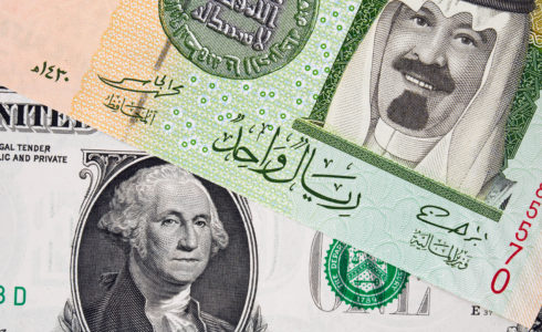 US and Saudi Arabian currency (src: Shutterstock)
