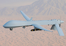 White drone flying over a desert