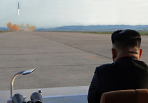 Kim Jong Un viewing a missile launch test