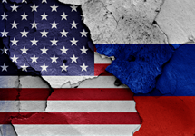 US and Russian flags as one torn flag