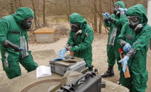 OPCW inspectors participate in a chemical weapons field exercise. (Src: opcw.org)
