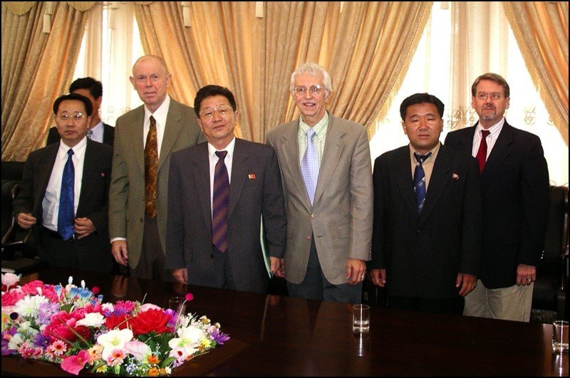 Group of North Korean officials and the American delegation at a meeting in 2006
