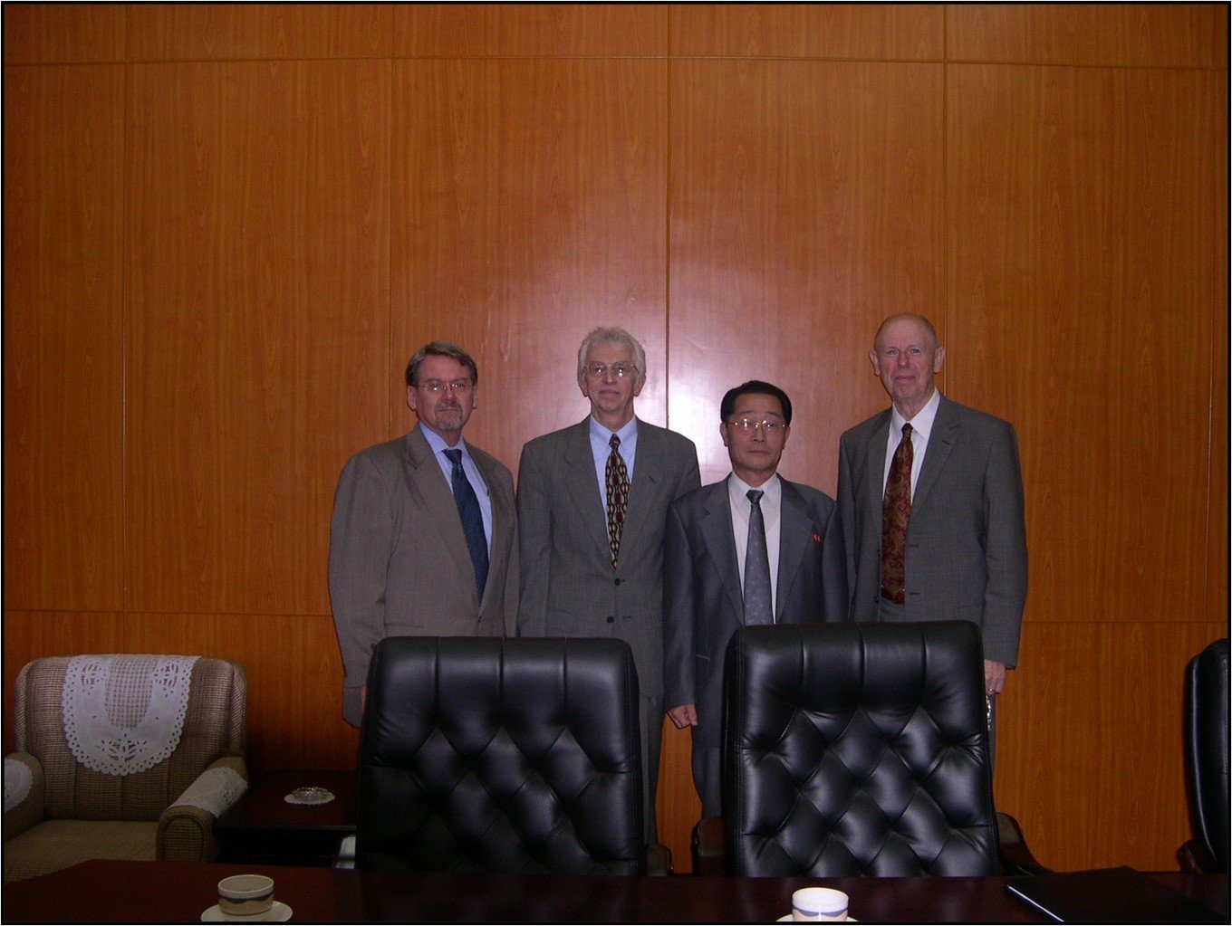 Three Americans and a North Korean host at a meeting in Aug. 2005