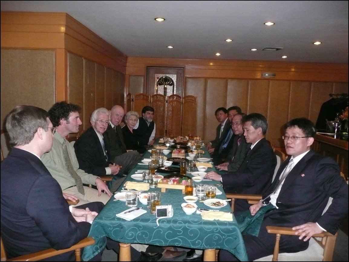 Americans on one side of the table with North Korean hosts on the other side.