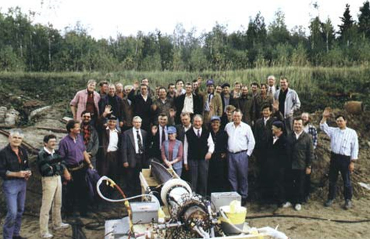 Group photo outside with equipment