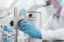 Lab technicians of scientists working on developing a vaccine against virus disease (Src: Shutterstock)