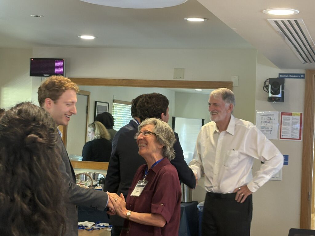 Pattisons talking with students