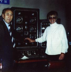 Cas Mason with Dr. Dias Daukeyev with her finger on the red button. Kurchatov City, 1997.