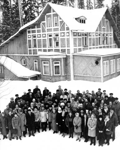 Group of people standing outside in front of a building