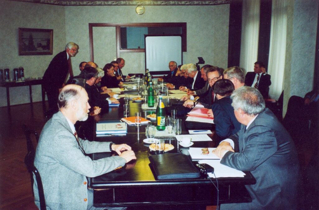 Group seated around a conference table in discussion