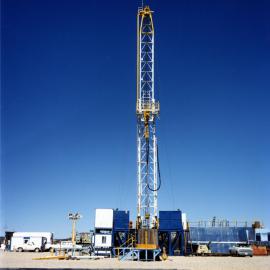 The U.S. DoE's Cardwell KB-500 drill proposed to drill a CORRTEX instrumentation hole for a JVE at Semipalatinsk Test Site. The rig weighs 110,000 pounds and can drill holes up to 12.25 inches in diameter to a depth of over 6,000 feet.