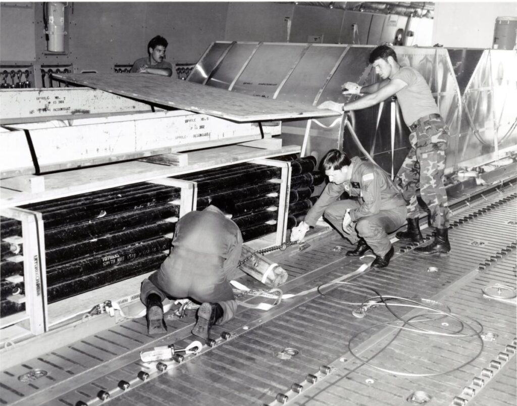 U.S. Air Force personnel are tying down 130,000 pounds of CORRTEX equipment from the NTS for shipment to the Soviet Union's nuclear weapons test site at Semipalatinsk. July 15, 1988